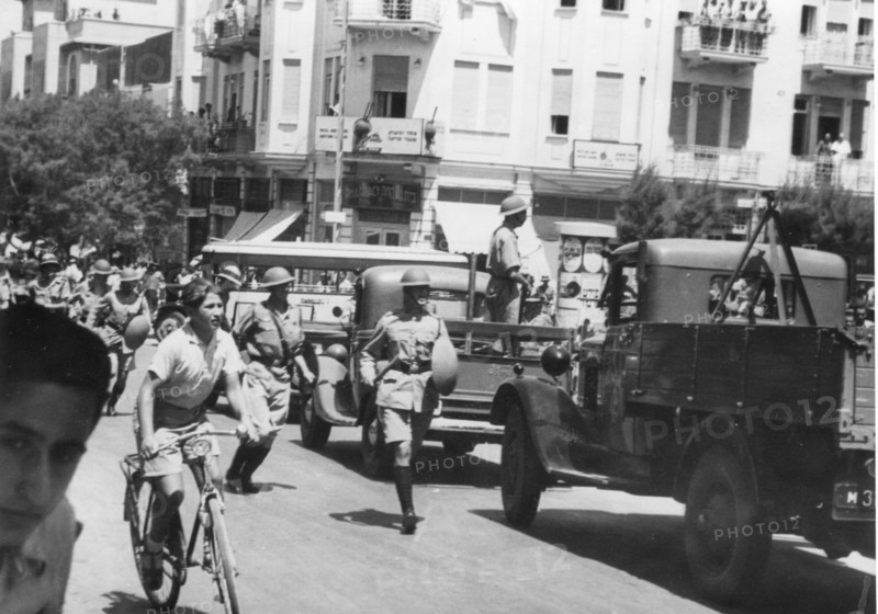 British police use weapons of clubs and shields to disperse demonstrators from an anti-Arab demonstration by Jews in Tel Aviv.