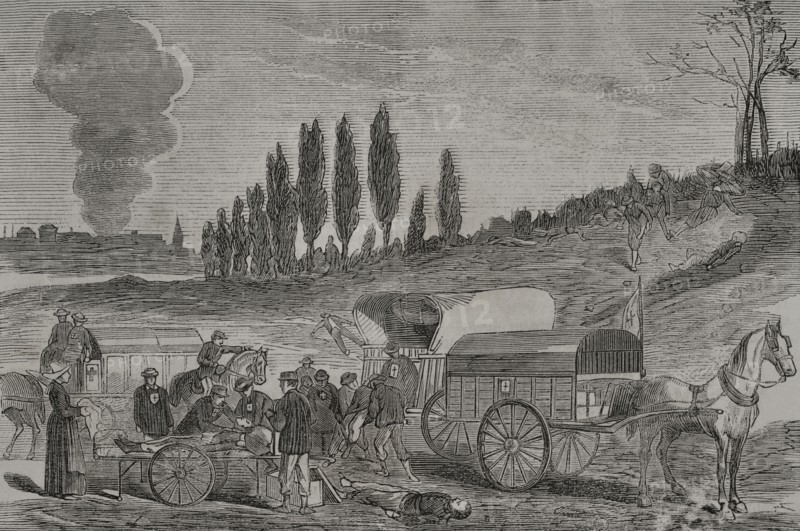 Franco-Prussian War (1870-1871). Burial of the dead by ambulances. Engraving. ""Historia de la Guerra de Francia y Prusia"" (History of the War between France and Prussia). Volume II. Published in Barcelona, 1871.