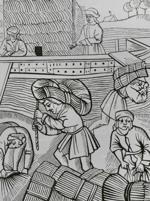 France. Carriers of hay. Facsimile of an engraving from """"Les ordonnances royaux sur le faict et jurisdiction de la prevoste des marchands et eschevinage de la ville de Paris"", Paris, 1528. ""Moeurs, usages et costumes au moyen-age et a l'epoque de la Renaissance"", by Paul Lacroix. Paris, 1878.