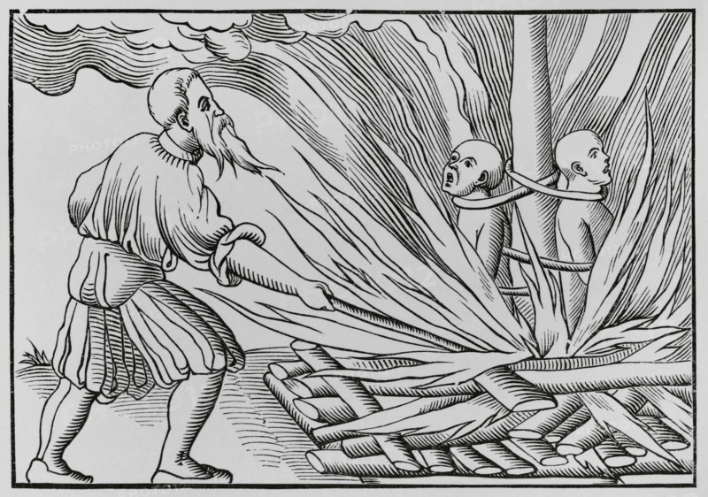 Torture by fire. Engraving after a woodcut in Sebastian Munster's ""Cosmographia universalis"", published in Basel in 1552. ""Moeurs, usages et costumes au moyen-age et a l'epoque de la Renaissance"", by Paul Lacroix. Paris, 1878.