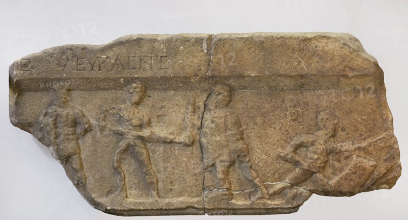 Gladiator fight. Greek inscription: ""Leukaspis"" (name of the gladiator). Fragment of a marble slab. From Stara Zagora (Augusta Traiana), Bulgaria. First half of the 2nd century AD. National Archaeological Museum. Sofia. Bulgaria.