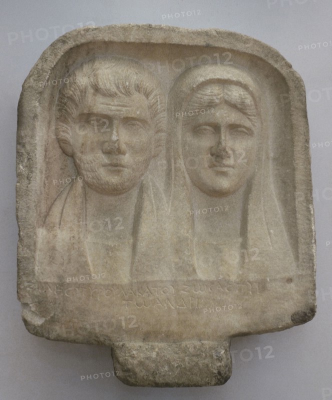Bust of a bearded man and a woman. Inscription in Greek. Stele of Ziles, son of Pyroulas, erected by his wife Katou. First half of the 3rd century AD. From Laskarevo, Blagoevgrad region, Bulgaria. National Archaeological Museum. Sofia. Bulgaria.