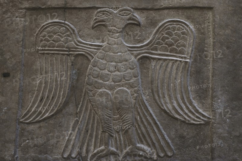 Double-headed eagle in heraldic attitude. Relief on a facing slab. Red schist. 11th-12th centuries AD. From Stara Zagora (Vereia), Bulgaria. National Archaeological Museum. Sofia. Bulgaria.