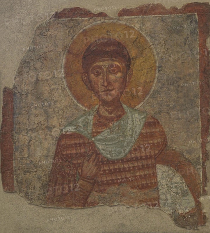 St. Demetrius of Thessalonica (ca. 270- ca. 306). Greek Christian martyr who suffered martyrdom in Sirmium (present-day Sremska Mitrovica, Serbia). Fresco. 12th-13th centuries. From the Church of St. Nicholas in Melnik, Blagoevgrad, Bulgaria. National Archaeological Museum. Sofia. Bulgaria.