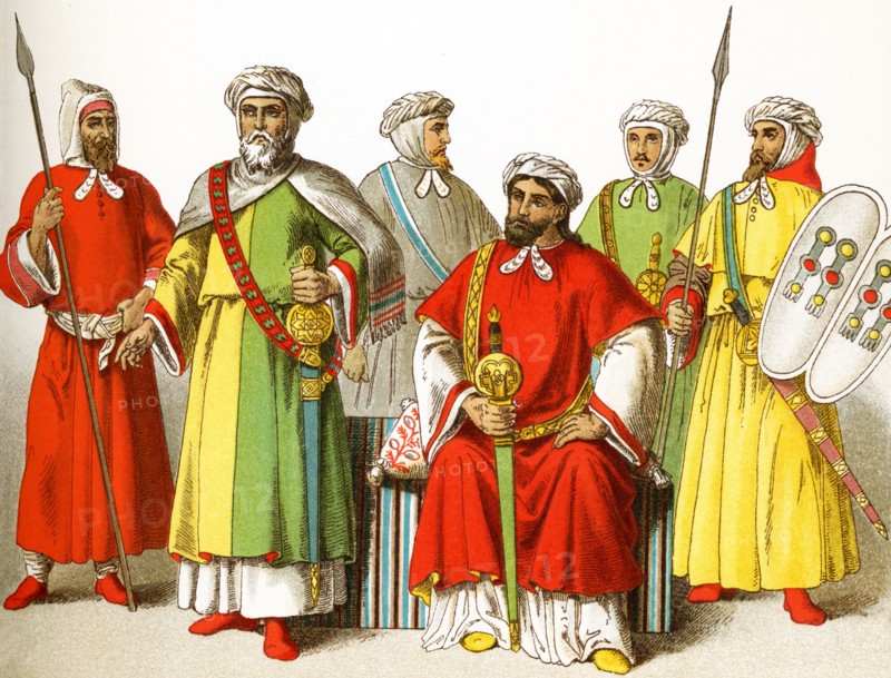 The figures dpeicted here represent Moors around A.D. 1300. They are, from left to right: a warrior, four kings of Granada, and another warrior. The illustration dates to 1882.