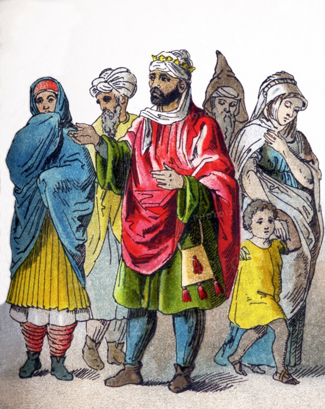 These figures represent Moors in 1500. They are, from left to right: a woman, man, king, man, boy, and a woman. The illustration dates to 1882.