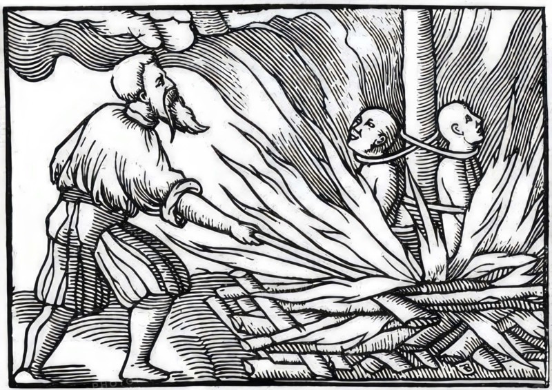Burning of witches in the 18th century, shaven witches tied to the stake, the torturer setting fire, France, Historic, digitally restored reproduction from an original of the time..