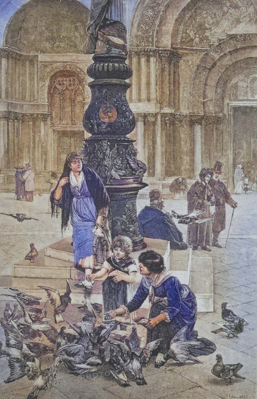 Children feeding pigeons in St Mark's Square in Venice.