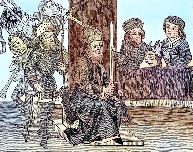 Burggraf Friedrich kneels in front of the Emperor and holds the fief flag that has just been received.
