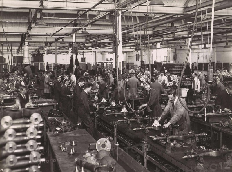 Wolseley factory interior with workers at machinery, Wolseley Motor Company was a British car manufacturer, Birmingham, 1932, England, Historic, digitally restored reproduction from a 19th century original.