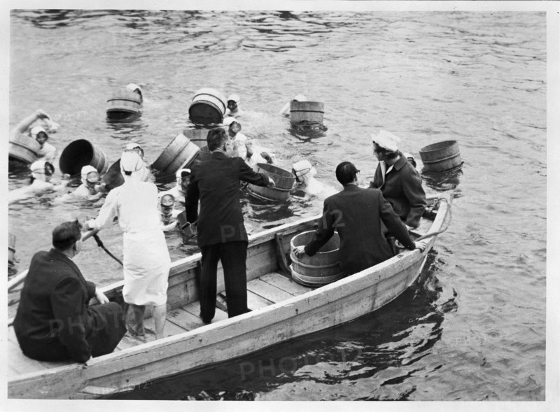 Alexandra (R) visiting a pearl farm in Toba, state Mie; pearl divers.