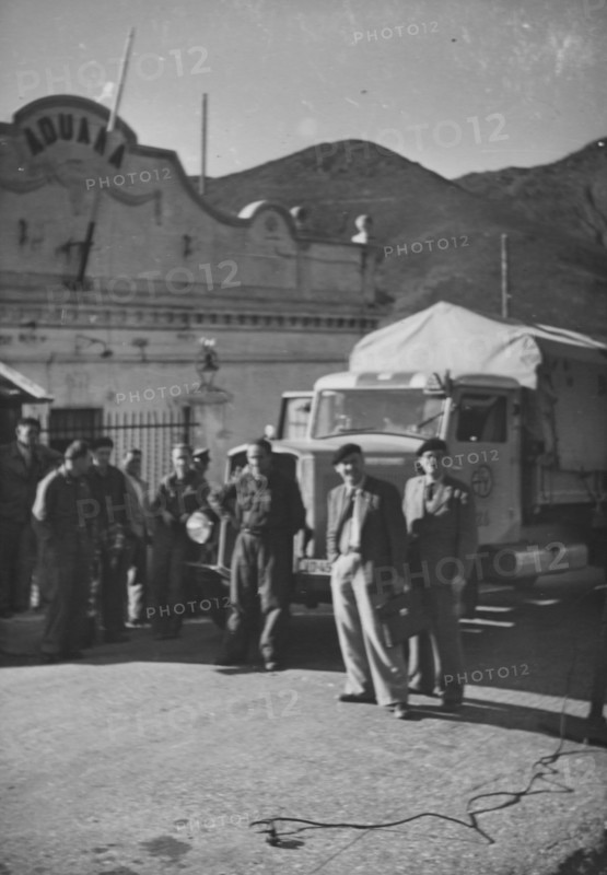 Swiss truck, driver at the customs; 1944.