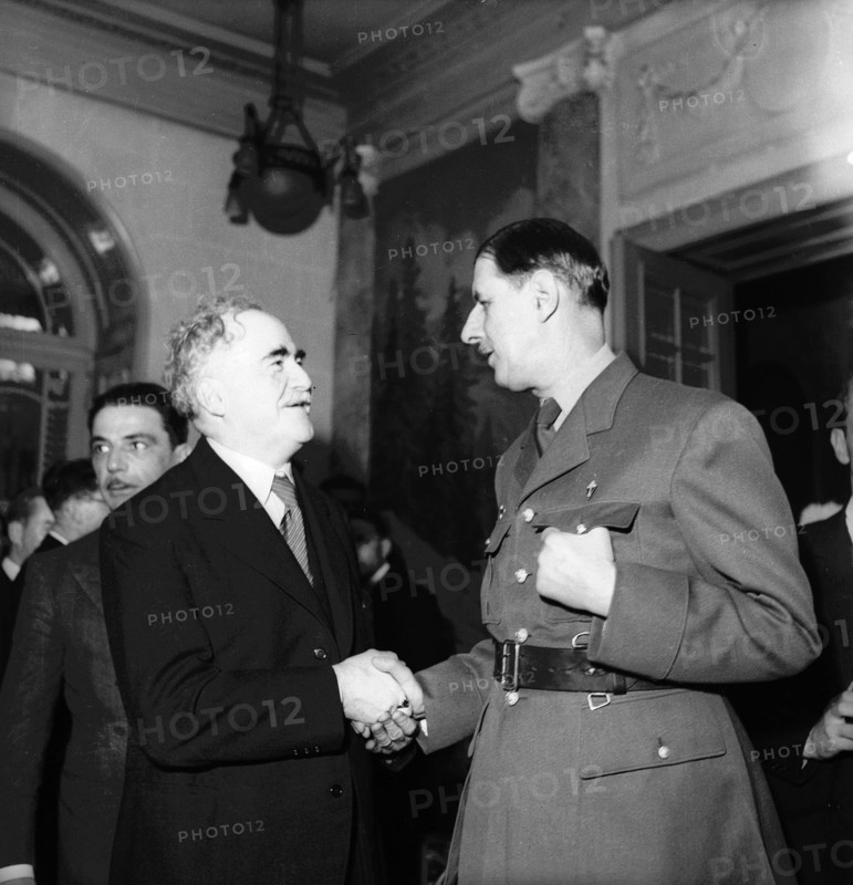General Charles de Gaulle, right,  in Geneva, 1946.