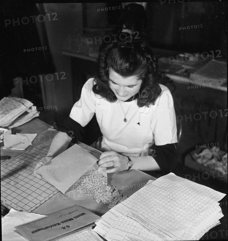 Public administration of food ration cards, coupons, around 1945.