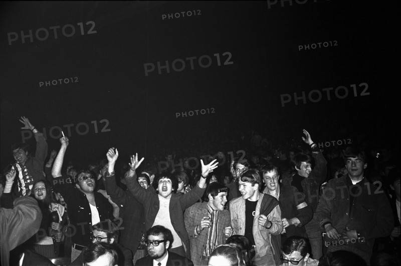 Cheering fans at Rolling Stones concert at Hallenstadion, Zurich 1967 .