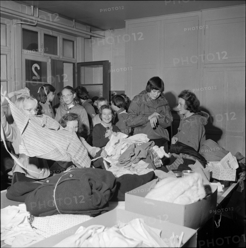 Basel girl scouts sorting clothing for Hungary 1956