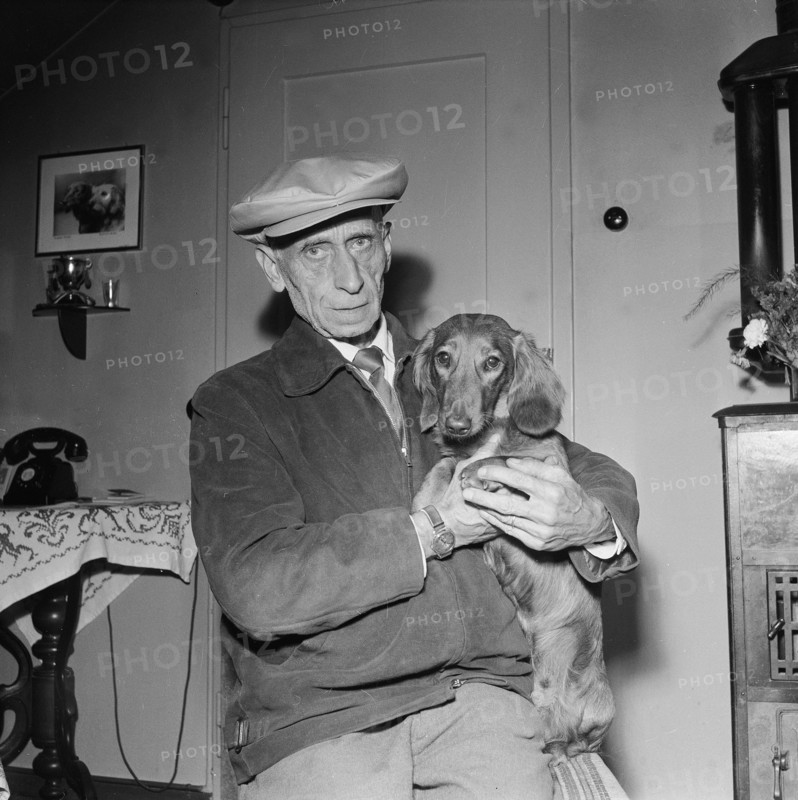 Emil Senn with his dog, 1956