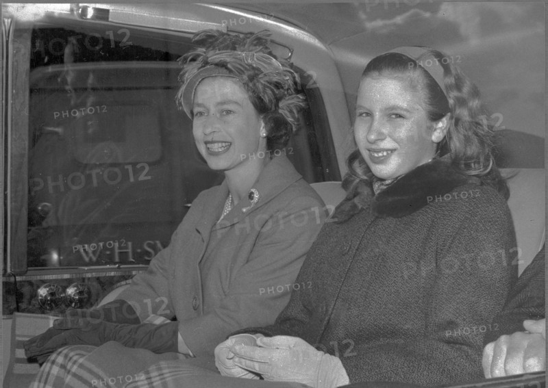 Queen Elizabeth returns home from trip to New Zealand and is being picked up at the airport by princess Anne