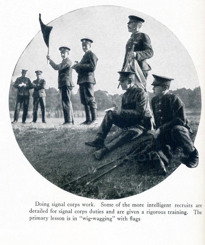 This photo taken in Europe in World War I has as its caption: Doing signal corps work. Some of the more intelligent recruits are detailed for signal corps duties and are given a rigorous training. The primary lesss in 'wig-wagging' with flags. The name 'wig-wagging' reflects the concept of back and forth movement as a means of signaling through motion.