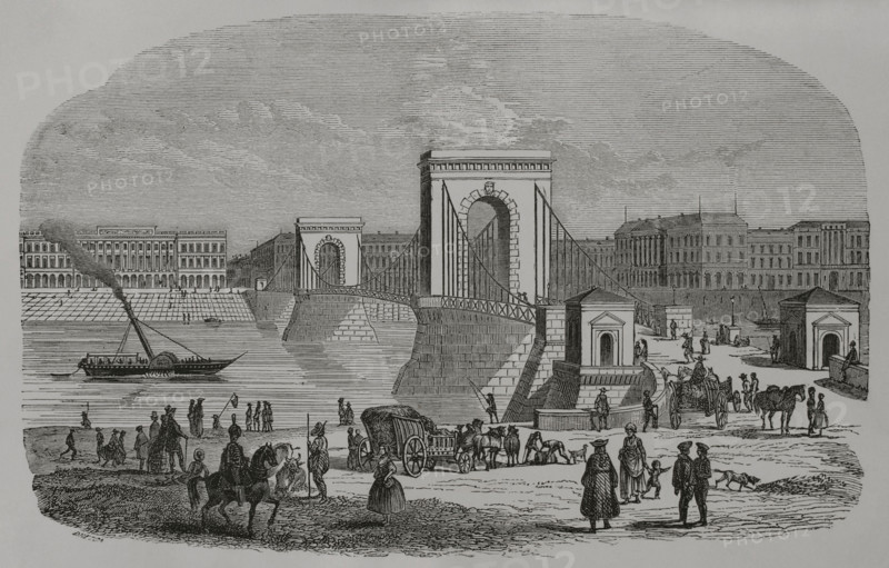 Hungary. Chain Bridge. Bridge over the Danube River which connected the two cities of Buda and Pest. It was designed by the English engineer William Tierney Clark (1783-1852) and built by the Scottish engineer Adam Clark (1811-1866). The construction began in 1839 and it was inaugurated on 20 November 1849. Engraving. ""Los Heroes y las Grandezas de la Tierra"" (The Heroes and the Grandeurs of the Earth). Volume VIII. 1856.
