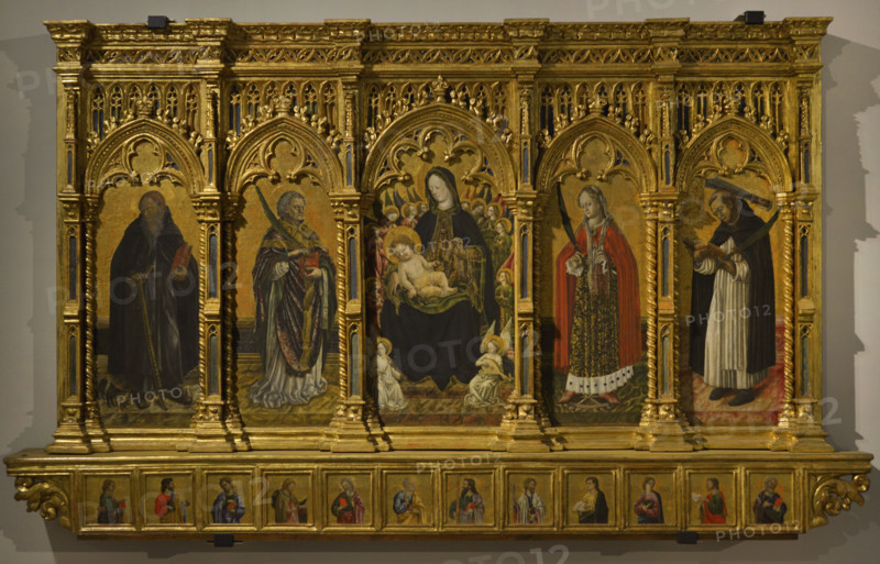 Benedetto Bembo (ca. 1423-1489). Italian painter. Torchiara Polyptych, 1462. In the centre, the Virgin with Child and angels. From left to right: St. Anthony abbot, St. Nicomedes, St. Catherine of Alexandria and St. Peter Martyr. In the predella, the Twelve Apostles. Tempera on wooden panel transferred to canvas, except the predella. Carved wood, gilded and painted frame (123 x 229 x 25 cm). Pinacoteca Castello Sforzesco, Milan, Italy.