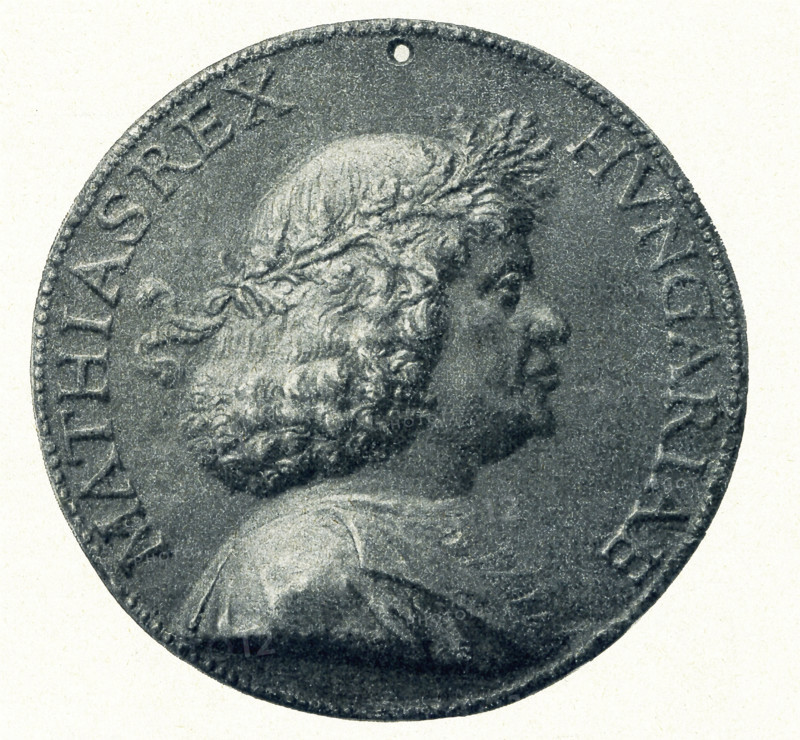 Matthew Corvinus (also spelled Matthias Corvinus) was king of Hungary and also Croatia.. He lived from 1443-1490. This bronze medal with his head in profile and words 'Matthias Rex Hungariae' (Matthias, King of Hungary). Matthias was said to have ruled a 'European superpower' by the end of his reign. His many wars were paid for by taxing the peasants heavily. This medal was by an Italian artisan unknown to us today.