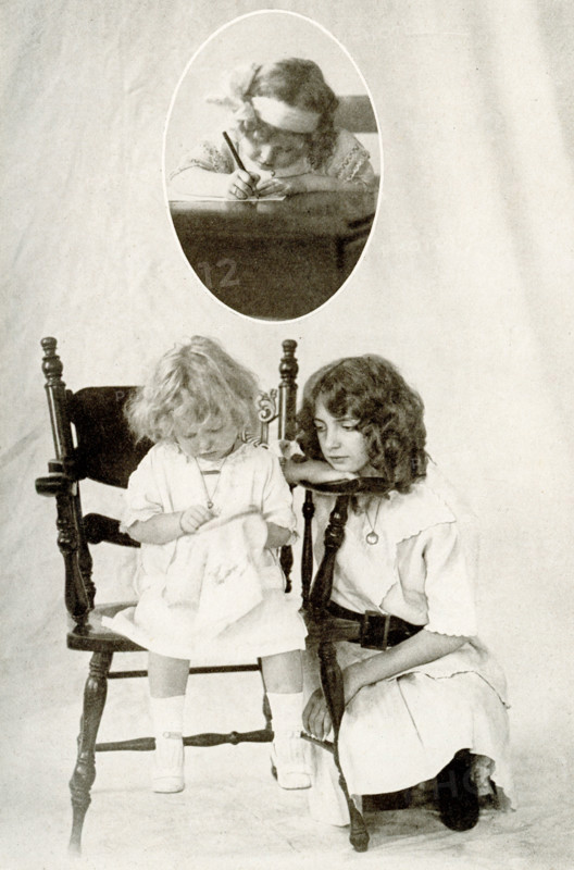 This 1917 image shows photos of  young child writing (top inset), sewing, with an older girl watching her.