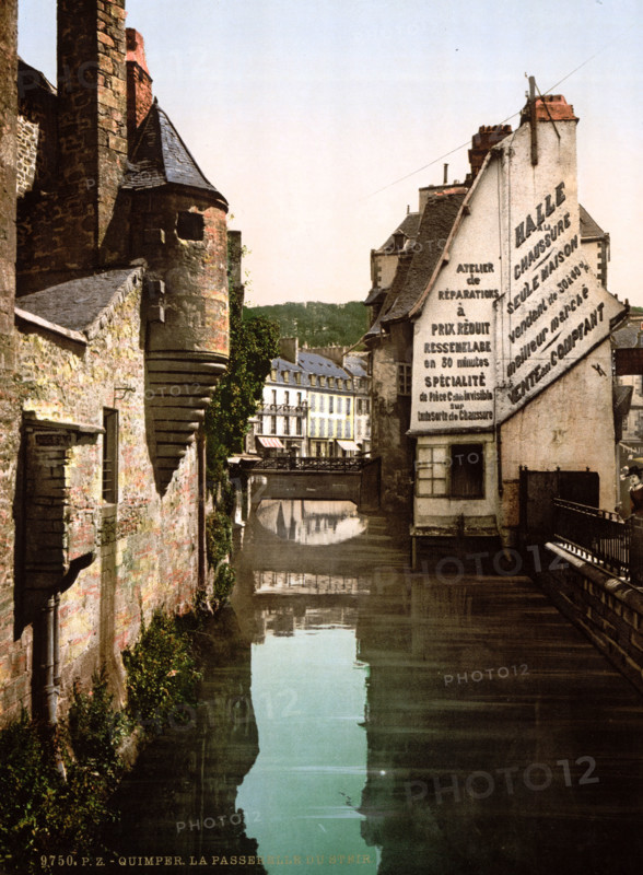 The pedestrian bridge over the Steir in Quimper, Brittany, France, historical, digitally restored reproduction from an original from the 19th century.