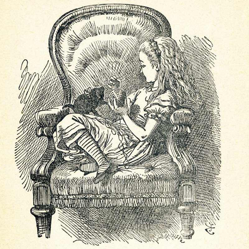 This illustration of Alice sitting with a black cat in a chair in the house is from ""Through the Looking-Glass and What Alice Found There"" by Lewis Carroll (Charles Lutwidge Dodgson), who wrote this novel in 1871 as a sequel to ""Alice's Adventures in Wonderland."" The black cat here is ""Kitty,"" the kitten of Dinah, Alice's cat in the Wonderland novel.