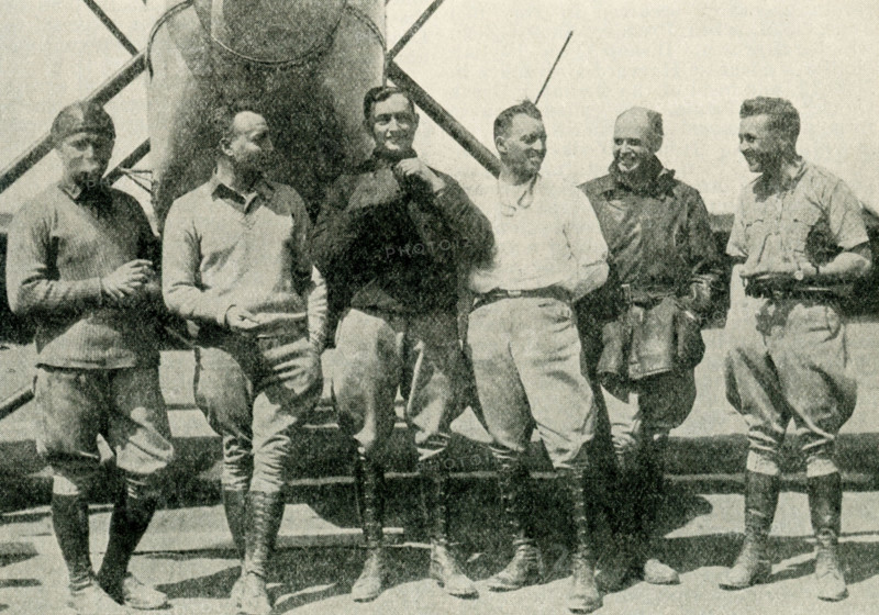These photos dates to 1924. The caption reads: The First Men to Fly Around the World. In the upper picture is shown the return of the United States Army aviators to San Diego, Calif., September 22, 1924, after their world-girdling flight. Their total flying time was 375 hours 11 minutes. Below are the navigators of the three successful planes, Lieutenants Wade, Arnold, Smith, Ogden, Nelson, and Harding.