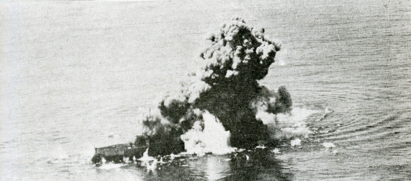 This photo dates to September 5, 1923. The caption reads An 1100-pound bomb explodes alongside. In 1922, the U.S. War Department classified the Virginia as a target ship for bombing tests, along with her sister ship the USS New Jersey. The New Jersey was bombed first and sunk and then the Virginia.