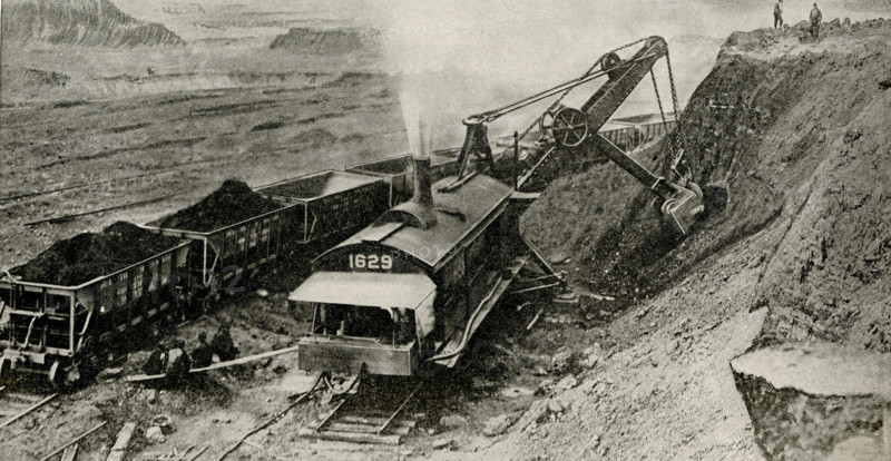 Open Pit Mine from which ore comes. Most of the iron ore mined in North American comes from the open pit mines of the Lake Superior region. The deposits are sometimes three hundred feet deep and seem almost inexhaustible. Here you see a stream shovel digging into the bank and loading the cars. One of these machines does more work than a thousand men could do with picks and shovels.