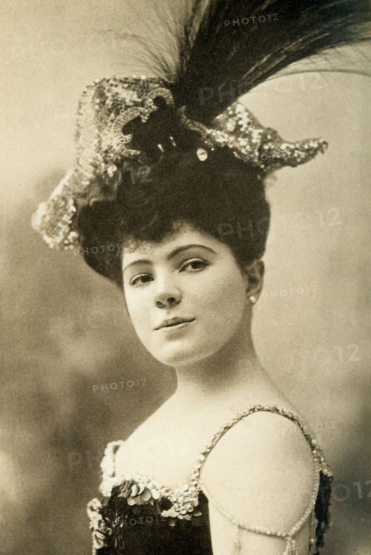 This photo, dating to around 1908, shows Madame Fritzi Scheff, one of the most popular light opera singers at the time. She was Viennese by birth, made her debut n Frankfort as Juliet. Sang in all the cities of Europe in grand opera. She came to the United States in 1900, appearing in Fidelio, La Boheme, and I Pagliacci. She was married to Baron von Bardeleben, a German Hussar. She was nicknamed Paderewski (""the little deviling of grand opera"").