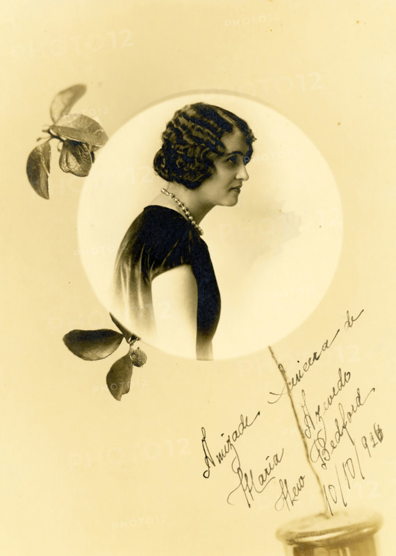 The photographer of this image is M Goulart of New Bedford, Massachusetts. Manuel Goulart is a noted historical figure in American photography. In fact, he and his brother Jose Goulart were the subject of a book, ""Two Brothers Goulart: Photography in New Bedford and the Azores"" (1996). The Azorean brothers became interested in photography in the 1870's. They were from the Portuguese island of Faial in the Azores and came to New Bedford in 1889. Between 1892 and at least 1899, Manuel Goulart's studio was located at 109 South Sixth Street in New Bedford. Manuel died at the age of 80 in 1946 and had studio in New Bedford.  Mrs Palmeira 1926.