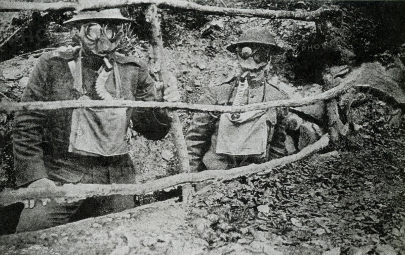 This photo, dating to before 1922, relates to World War I. The caption reads: Marines awaiting a gas attack. The U.S. Marines were nicknamed Teufle Hunden, or Devil Dogs.