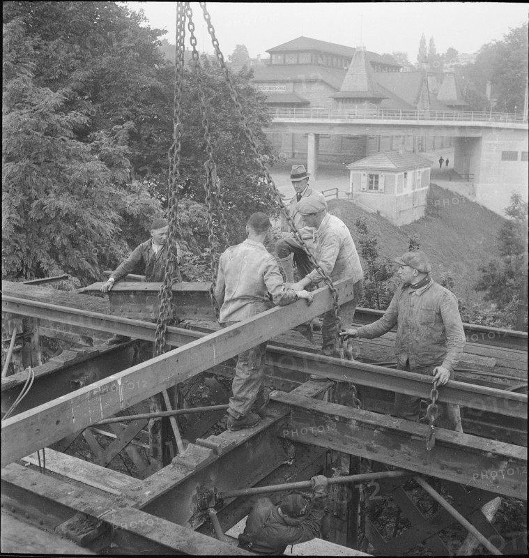 Construction worker demolishing a railway bridge 1941.