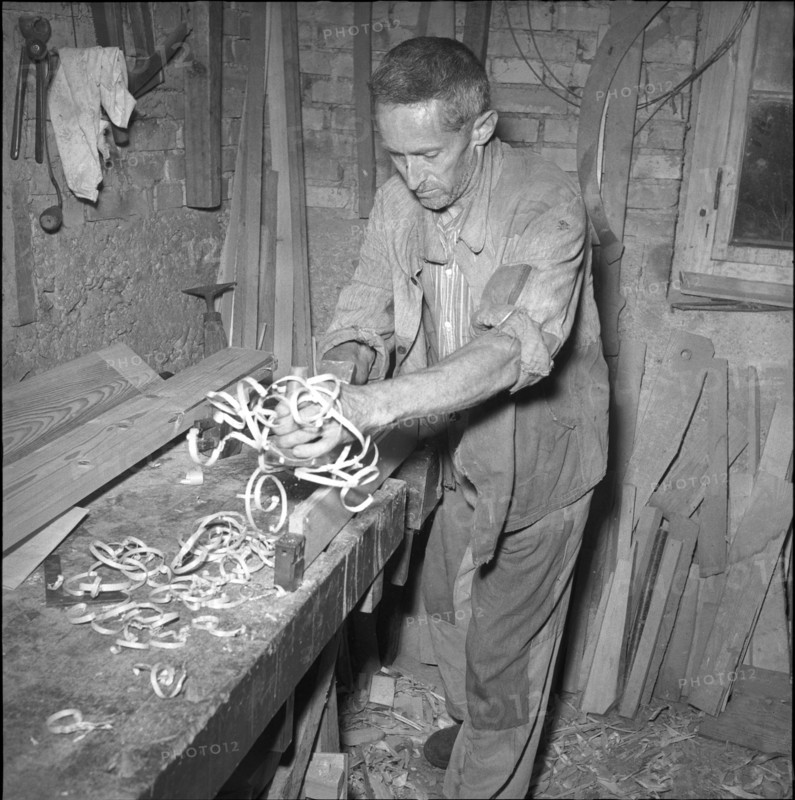 Alpthal; carpenter in his workshop; 1951.