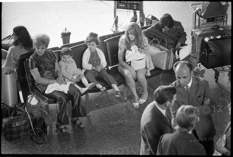 Tourists at airport Zurich-Kloten 1971.