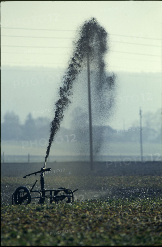 Sludge sprayer on a meadow, 1980.