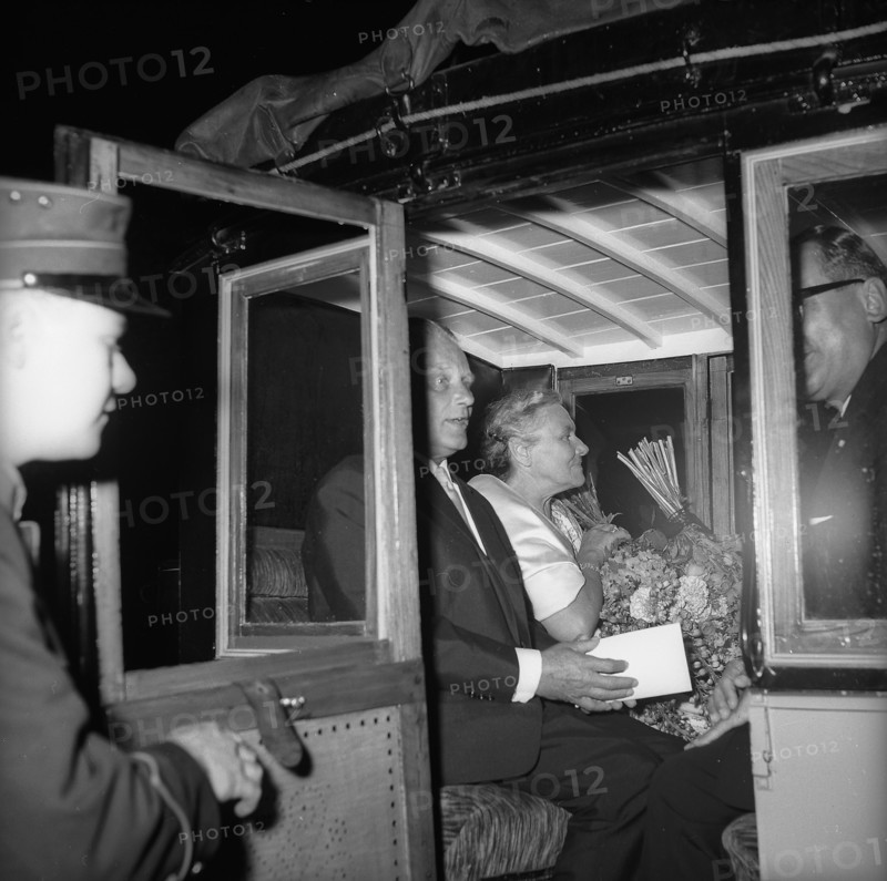 Horst Wolfram Geissler, left, in a stage coach, stagecoach.
