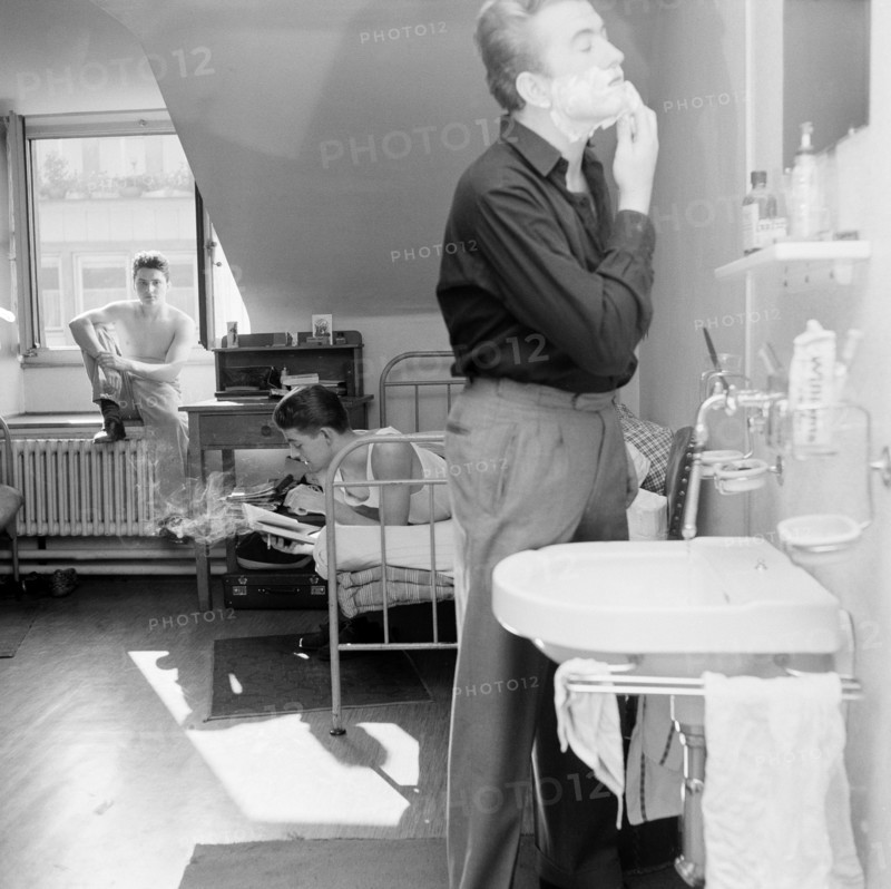 Basle, Hotel drei Konige: Hotel employee having a break.