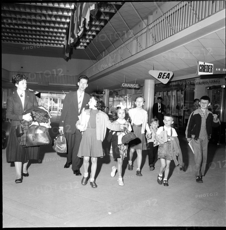 Gerold Zust with Hungarian children at airport Kloten 1957.
