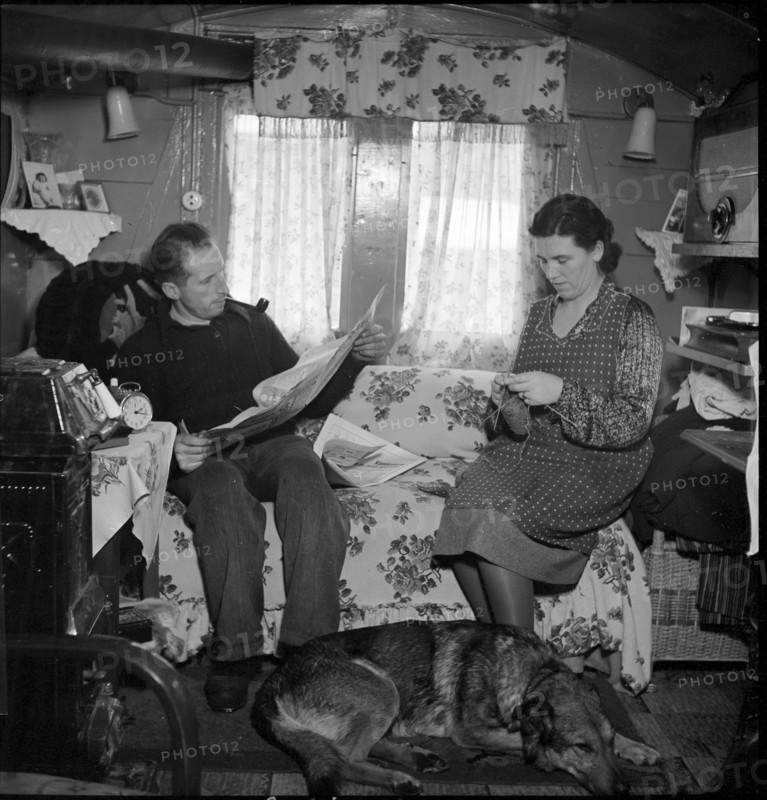 Yenish couple in living room, 1942.