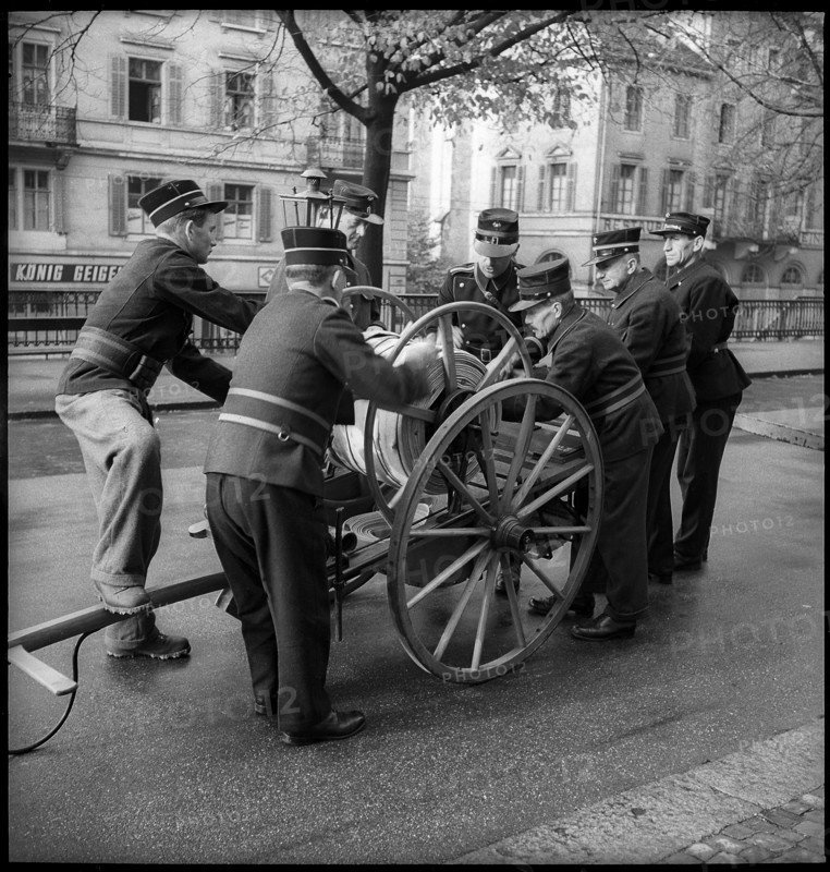 War fire brigade, men with hose cart, 1939.