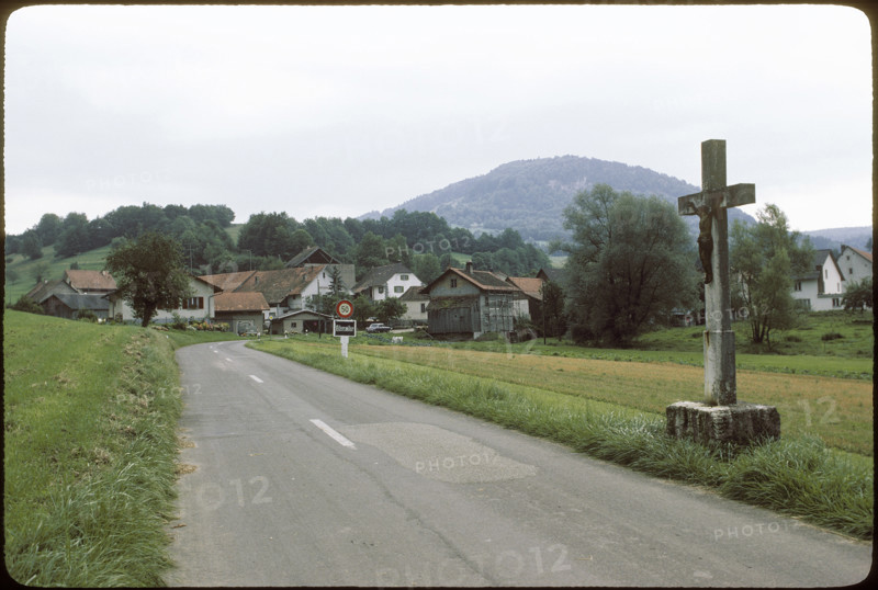 Cross on the roadside in Vellerat, 1980.