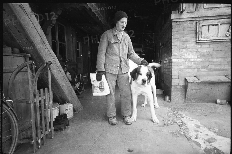 Man with dog in the Emmental, 1970.