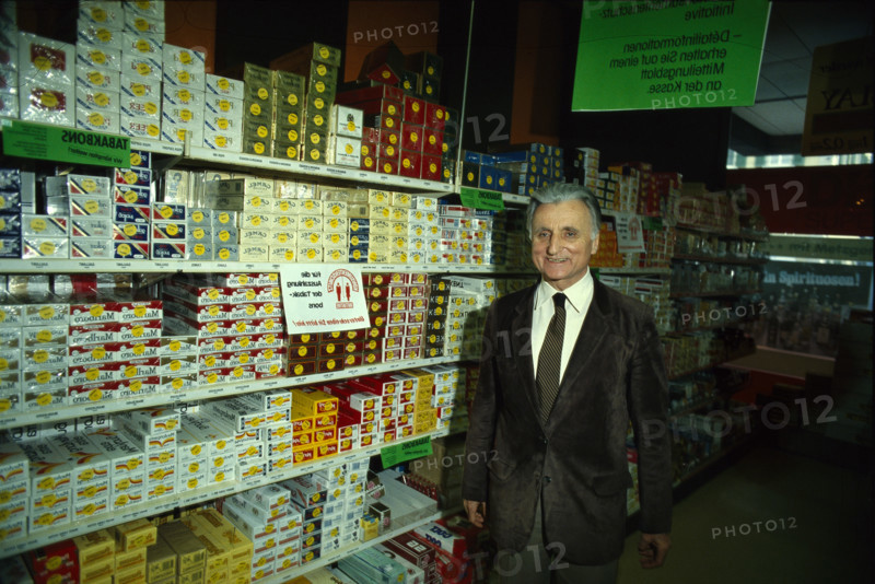 Karl Schweri in front of tobacco shelfs, 1984.