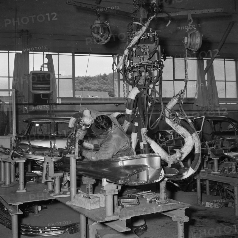 Assembly shop; coachbuilder at work; 1956.