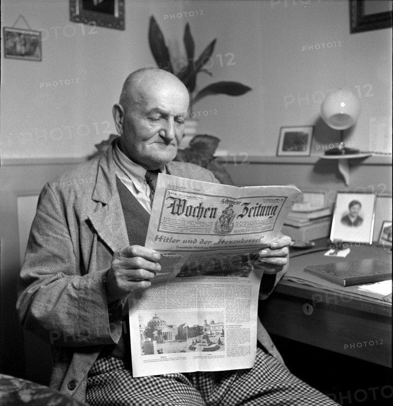 Newspaper Reader with the Wochenzeitung, 1944.