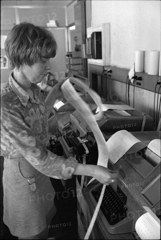 UPI office, telexist at telex terminal, 1970.